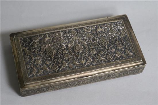 A Middle Eastern embossed white metal rectangular box, 16.1cm.